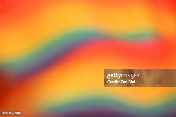 defocused multicolored belt creating wave patterns - yellow belt stock pictures, royalty-free photos & images