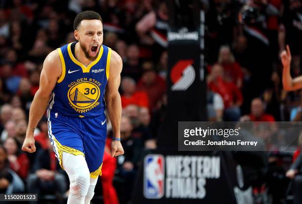 Stephen Curry of the Golden State Warriors reacts during the second half against the Portland Trail Blazers in game three of the NBA Western...