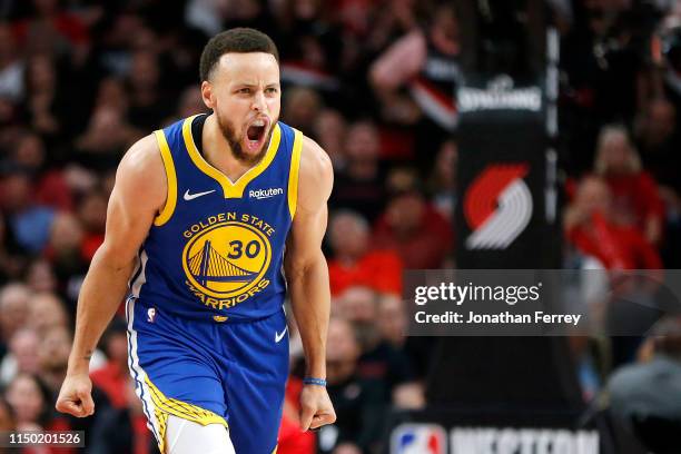 Stephen Curry of the Golden State Warriors reacts during the second half against the Portland Trail Blazers in game three of the NBA Western...