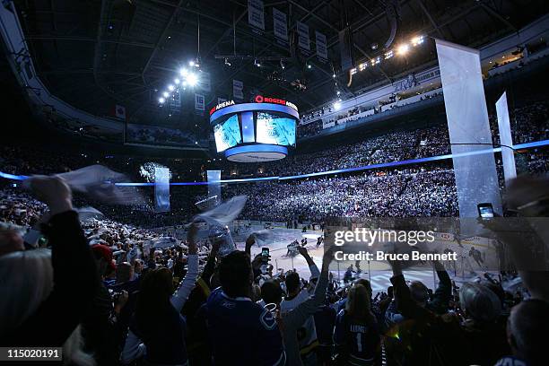 Fan waves towels before game one of the 2011 NHL Stanley Cup Finals between the Vancouver Canucks and the Boston Bruins at Rogers Arena on June 1,...