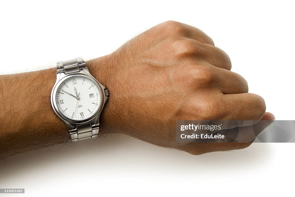 Wristwatch on a wrist - clipping path