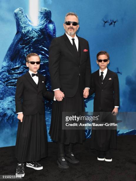 Miguel Bose and sons attend the premiere of Warner Bros. Pictures and Legendary Pictures' "Godzilla: King of the Monsters" at TCL Chinese Theatre on...