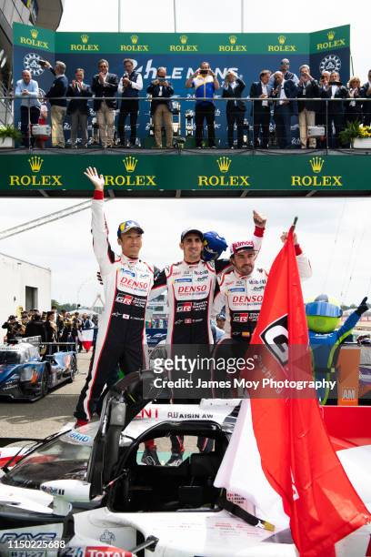 Race winners Kazuki Nakajima of Japan and Toyota Gazoo Racing, Sebastien Buemi of Switzerland and Toyota Gazoo Racing and Fernando Alonso of Spain...