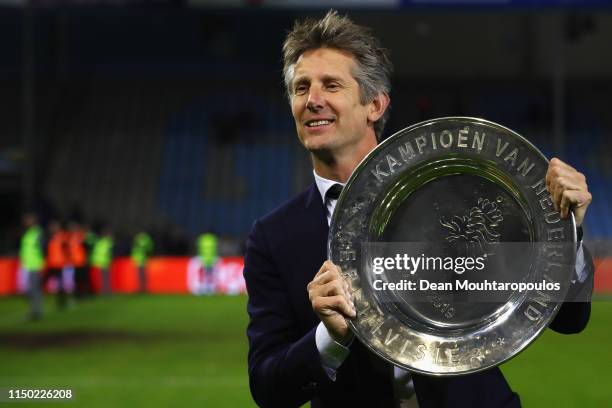 Edwin van der Sar, Chief Executive of Ajax celebrates with the trophy after winning the Eredivisie following the Eredivisie match between De...