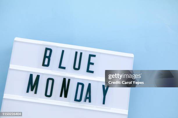 blue monday  text in lightbox - blue monday stock pictures, royalty-free photos & images