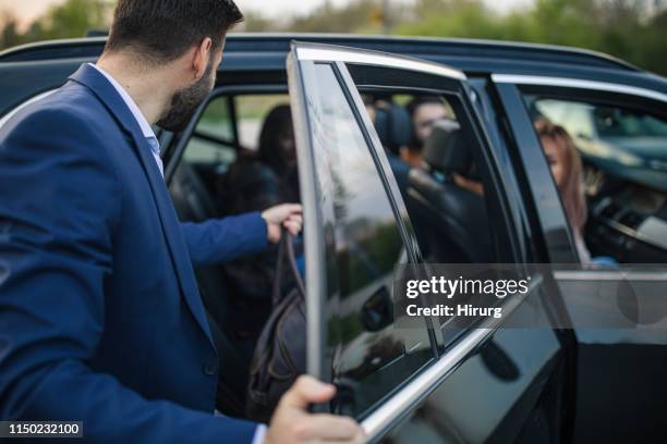 best friends traveling by a car - car sharing stock pictures, royalty-free photos & images