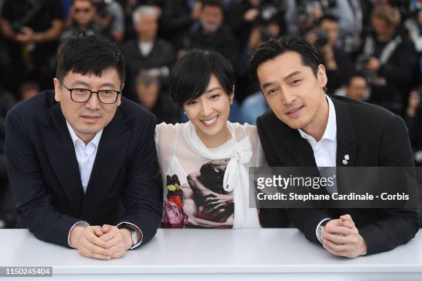 Diao Yinan, Gwei Lun-Mei and Hu Ge attend the photocall for "The Wild Goose Lake" during the 72nd annual Cannes Film Festival on May 19, 2019 in...