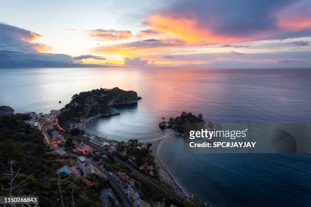 sunrise at isola bella taormina - teatro greco taormina bildbanksfoton och bilder