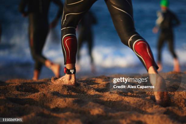 Athletes enter the sea and start the swim leg of the race during IRONMAN 70.3 Barcelona on May 19, 2019 in Calella, Spain.