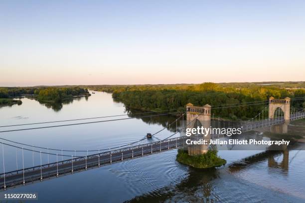 suspension bridge over the river loire at luynes, france. - indre y loira fotografías e imágenes de stock
