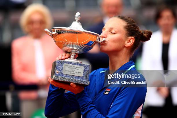 Karolina Pliskova of the Czech Republic kisses her winners trophy after her straight sets victory against Johanna Konta of Great Britain in the...