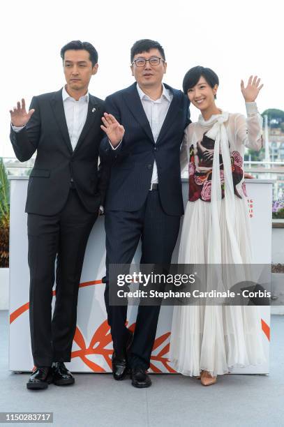 Hu Ge, Diao Yinan and Gwei Lun-Mei attend the photocall for "The Wild Goose Lake" during the 72nd annual Cannes Film Festival on May 19, 2019 in...