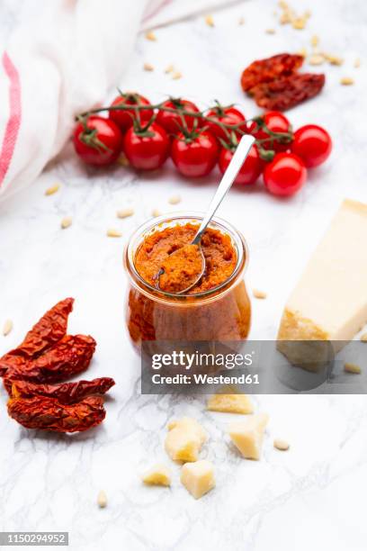 ingredients of tomato pesto - pesto sauce stock pictures, royalty-free photos & images