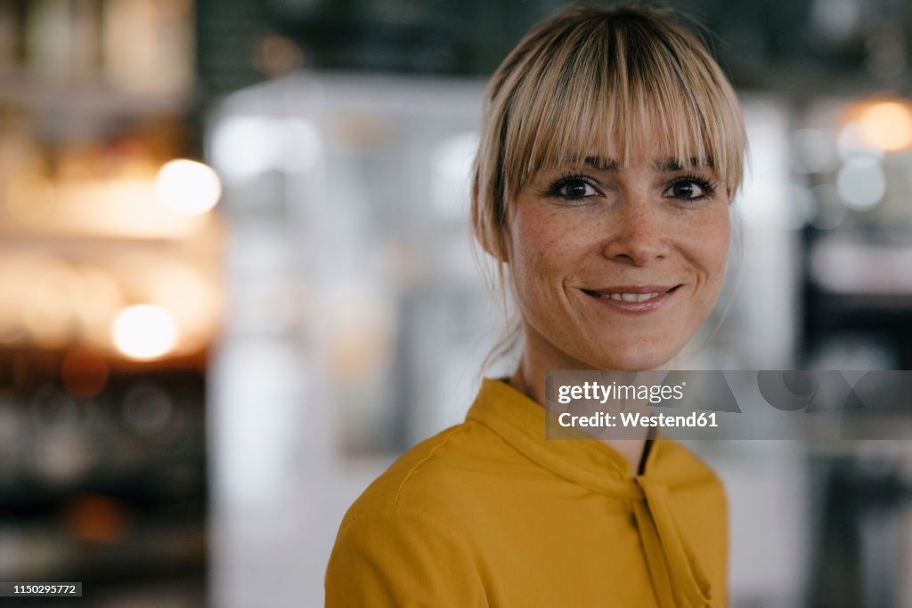 Portrait of a beautiful blond woman, smiling