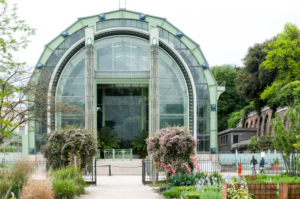 entry to a greenhouse in the paris botanical garden - zoo art stock pictures, royalty-free photos & images