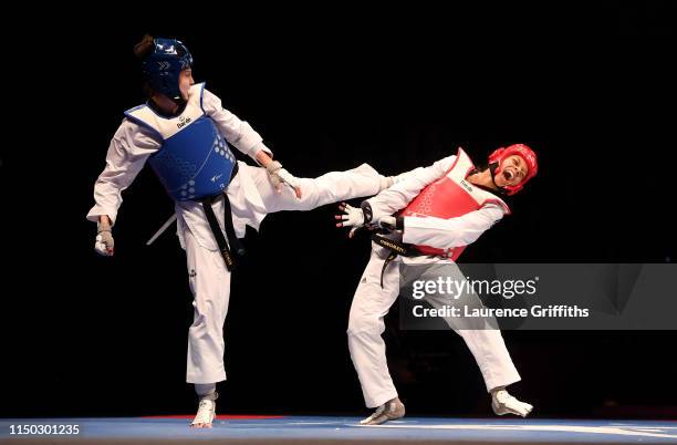 Irem Yaman of Turkey competes against Magda Wiet Henin of France in the Semi Final of the Women’s -62kg during Day 5 of the World Taekwondo...