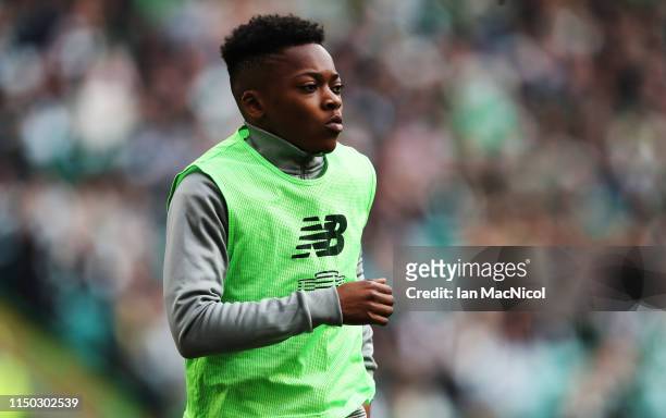 Karamoko Dembele of Celtic is seen warming up during the Scottish Premier league match between Celtic and Hearts at Celtic Park on May 19, 2019 in...