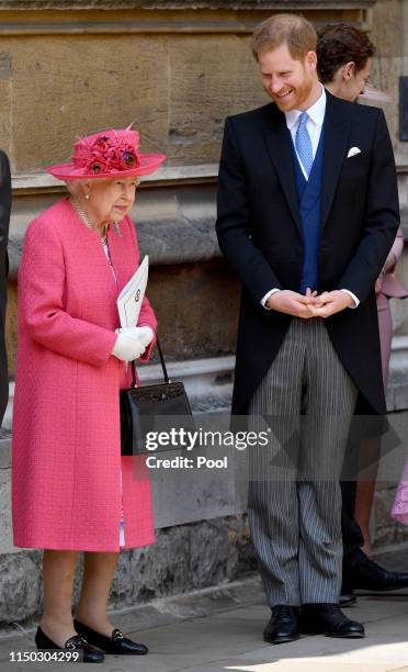 Queen Elizabeth II and Prince Harry, Duke of Sussex attend the wedding of Lady Gabriella Windsor and Thomas Kingston at St George's Chapel on May 18,...