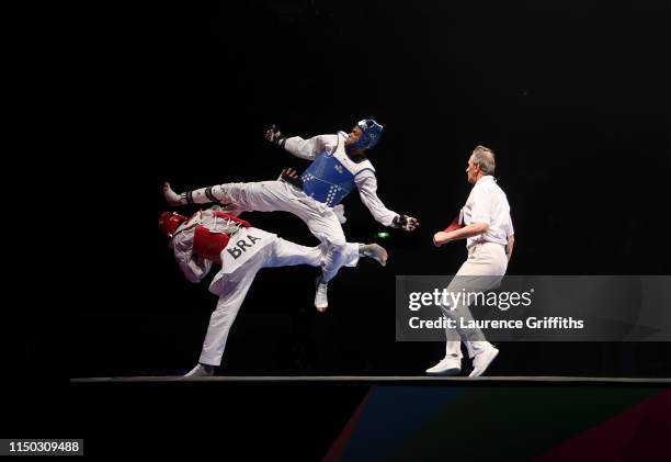 Rafael Alba of Cuba competes against of Maicon Siquera of Brazil in the Semi Final of the Mens +87kg during Day 5 of the World Taekwondo...