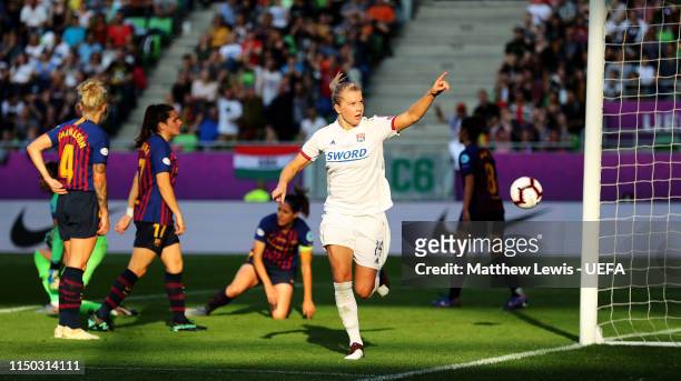 Ada Hegerberg of Olympique Lyonnais Women celebrates scoring her third and her sides fourth goal during the UEFA Women's Champions League Final...