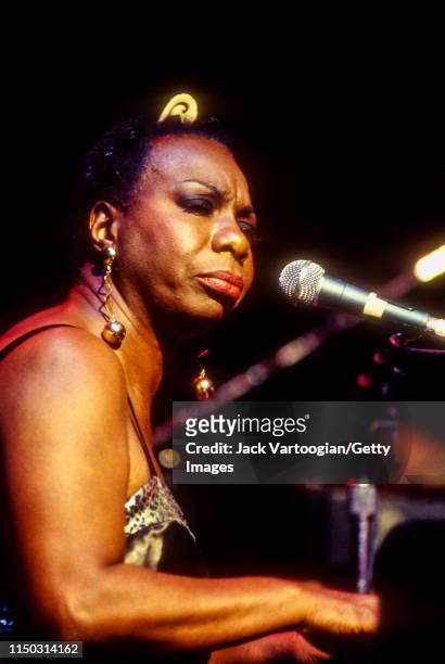American Jazz and Blues musician & Civil Rights activist Nina Simone plays piano as she performs at the Beacon Theater, New York, New York, May 1,...