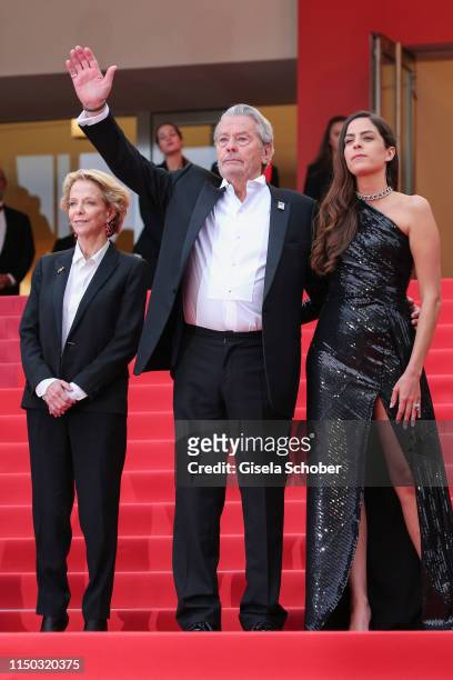 Frederique Bredin, Alain Delon and Anouchka Delon attend the screening of "A Hidden Life " during the 72nd annual Cannes Film Festival on May 19,...