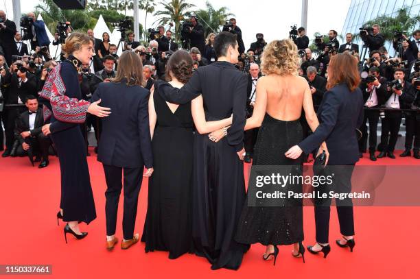 Adele Heanel, Celine Sciamma, Luana Bajrami, Noeomie Merlant, Valeria Golino and Benedict Couvreur depart the screening of "Portrait Of A Lady On...