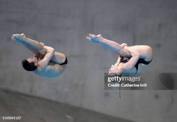 Tom Daley and Grace Reid compete in the mixed 3m Synchro final during Day Three of the FINA/CNSG Diving World Series at the London Aquatics Centre on...