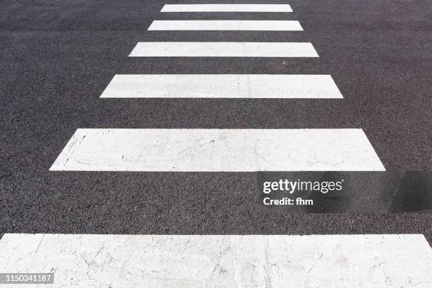 zebra crossing - road marking stock pictures, royalty-free photos & images