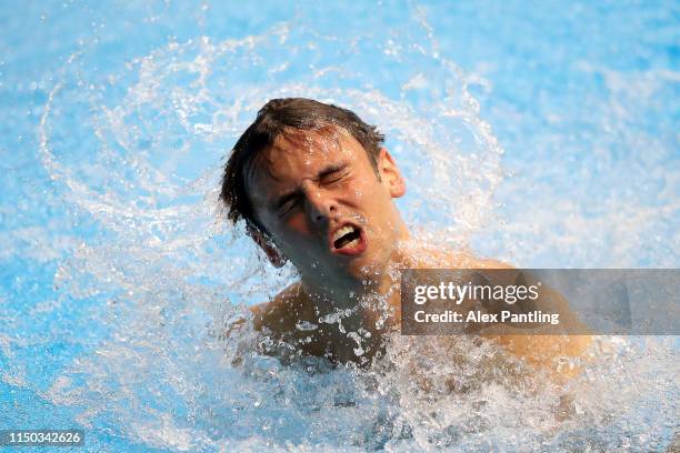 Thomas Daley Synchro partner of Grace Reid of Great Britain exits the pool in the Mixed 3m Synchro Springboard during day three of the FINA/CNSG...