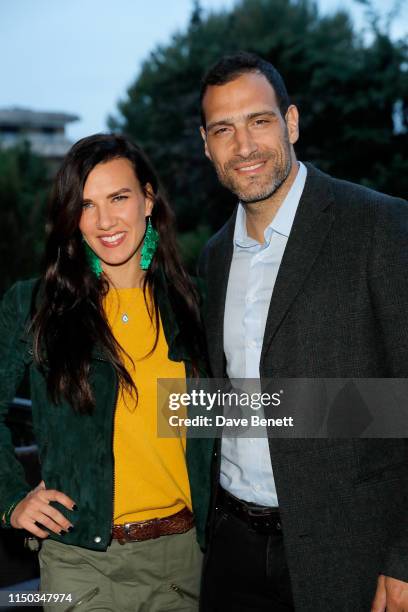 Natalie Burn and Marko Zaror attend the Raindance Filmmakers' Villa Party during the 72nd Annual Cannes Film Festival at Villa Jolie on May 19, 2019...