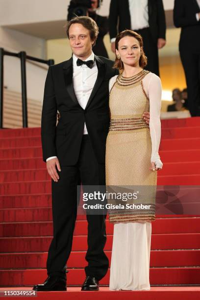 August Diehl and Valerie Pachner leave the screening of "A Hidden Life " during the 72nd annual Cannes Film Festival on May 19, 2019 in Cannes,...