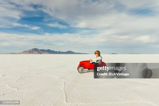 young business boy drives toy car - car remote toy stock pictures, royalty-free photos & images