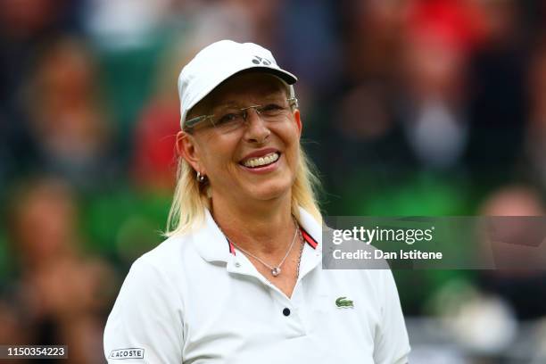 Martina Navratilova of the United States smiles during the mixed doubles match between John McEnroe of the United States and his partner Kim...