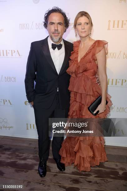 Alejandro Gonzalez Inarritu and María Eladia Hagerman attend the HFPA & Participant Media Honour Help Refugees' during the 72nd annual Cannes Film...