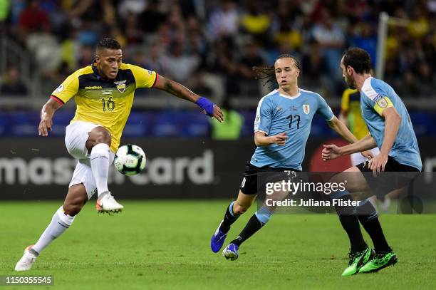 Diego Laxalt of Uruguay fights for the ball with Antonio Valencia of Ecuador during the Copa America Brazil 2019 group C match between Uruguay and...
