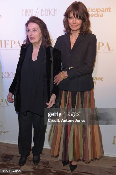 Anouck Aimee and Marianne Denicourt attend the HFPA & Participant Media Honour Help Refugees' during the 72nd annual Cannes Film Festival on May 19,...