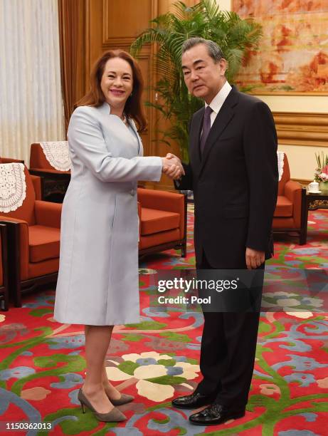 President of the UN General Assembly María Fernanda Espinosa Garcés is greeted by China's Foreign Minister Wang Yi before a meeting at the...