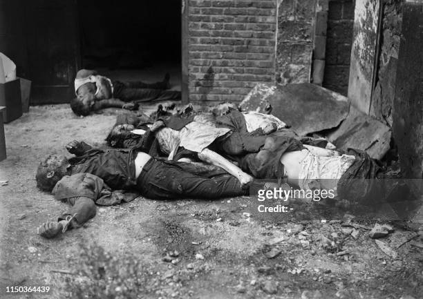 Picture taken on August 21 during the battle for the Liberation of Paris, of some of the 11 victims of the massacre of the Fort of Romainville,...