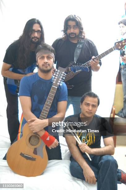 Pakistani singer Atif Aslam with his band members during a photoshoot, on June 29, 2007 in New Delhi, India.