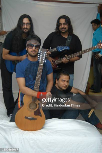 Pakistani singer Atif Aslam with his band members during a photoshoot, on June 29, 2007 in New Delhi, India.