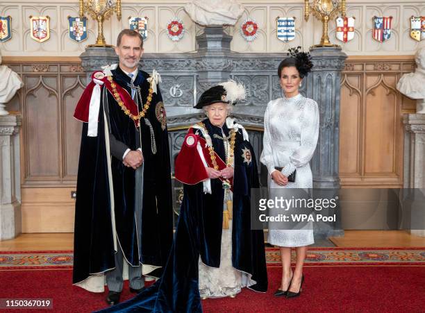 Queen Elizabeth II with King Felipe VI of Spain and Queen Letizia of Spain , after the king was invested as a Supernumerary Knight of the Garter,...