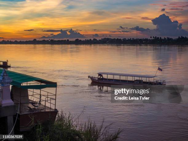Sunset over the Mekong River at Nong Khai in Northeastern Thailand, or Isan Province.