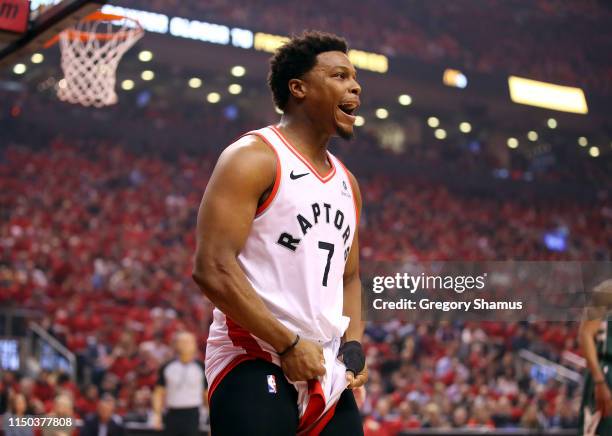 Kyle Lowry of the Toronto Raptors reacts to a call during the first half against the Milwaukee Bucks in game three of the NBA Eastern Conference...