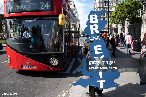 Pro Brexit protester with a Brexit map of the UK strapped to his back in Westminster as inside Parliament the Tory leadership race continues on 17th...