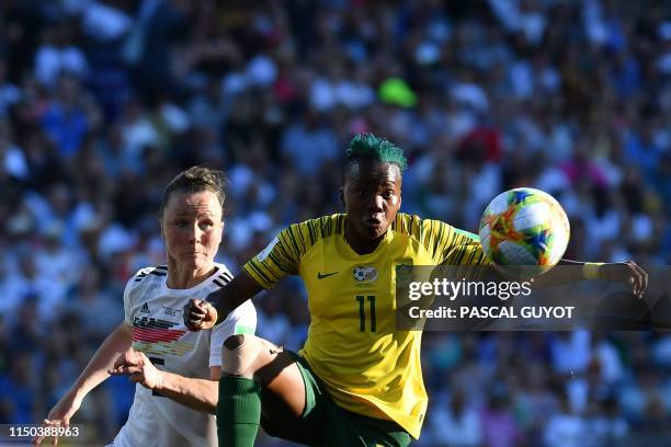 South Africa's forward Thembi Kgatlana vies for the ball with Germany's defender Marina Hegering during the France 2019 Women's World Cup Group B...
