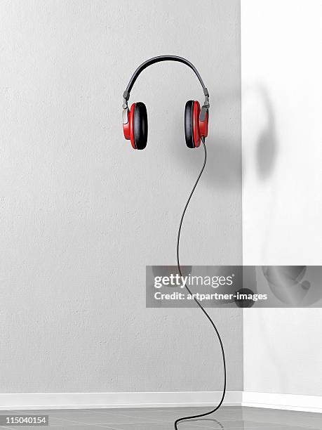 red floating stereo headphones - auscultador equipamento áudio imagens e fotografias de stock