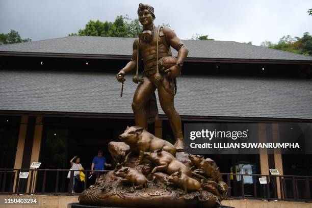 This picture taken on June 14, 2019 shows a statue of Saman Gunan, the Thai navy diver who died during the rescue effort of the Wild Boars football...