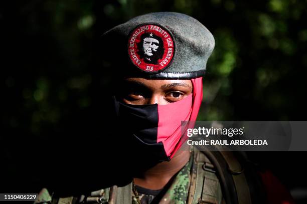 Members of the Ernesto Che Guevara front, belonging to the National Liberation Army guerrillas, is picture in tha jungle , in Choco department in...