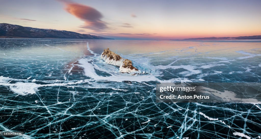 Panorama of Elenka Island at sunset on Lake Baikal in winter. Aerial view. Siberia, Russia